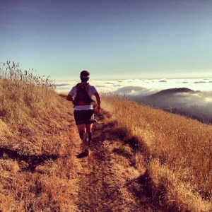 Jesse trying out his new hydration pack above the clouds.